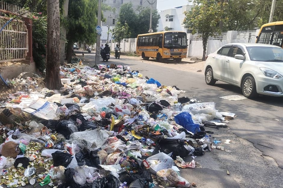 500 tons of garbage is rotting in the city, and sanitation workers have yet to collect it today.