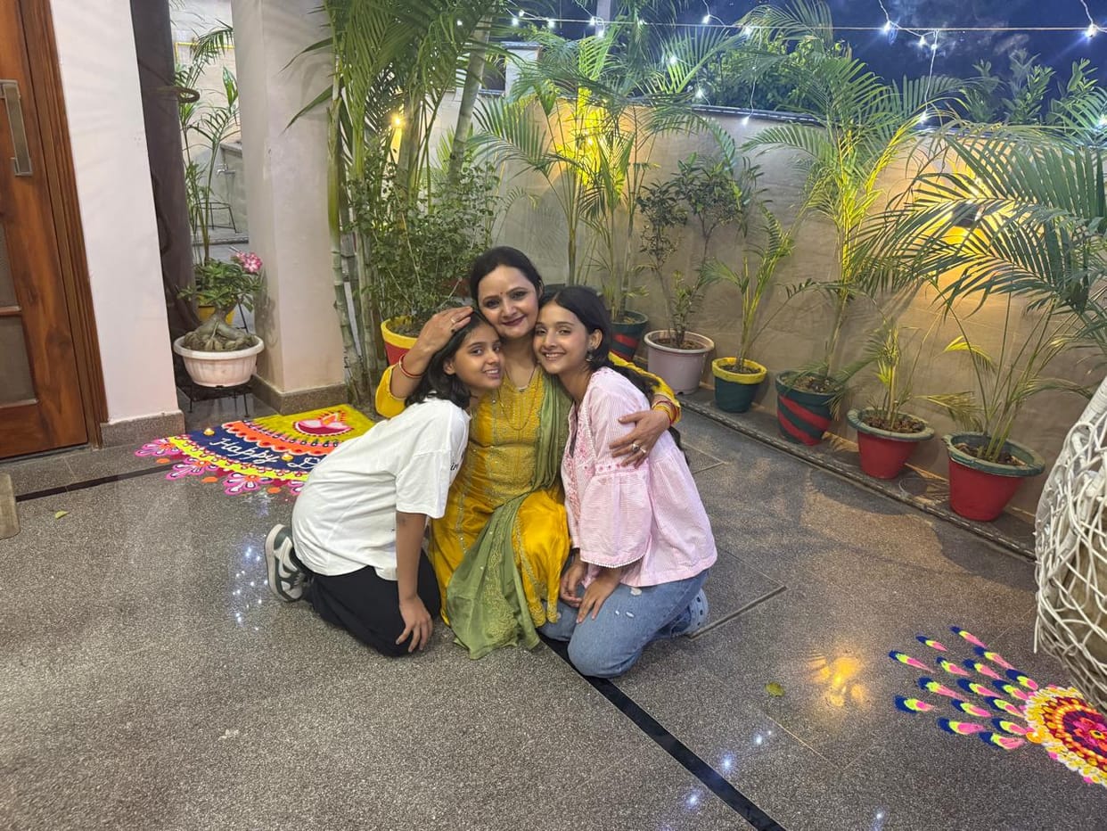A mother's world is reflected in her children...she nurtures them under the shade of her pallu.
