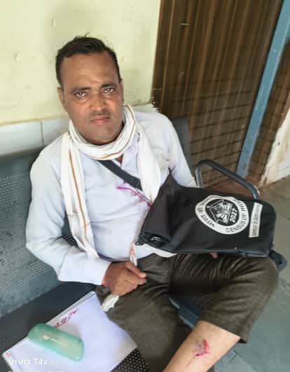 A teacher conducting a census was surrounded by dogs and taken to the hospital covered in blood.