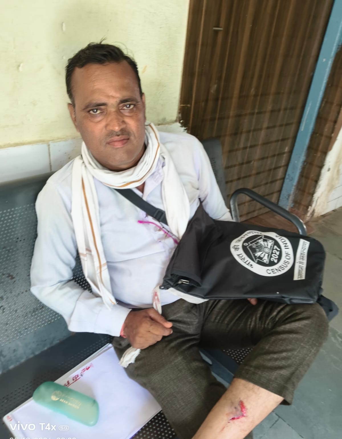 A teacher conducting a census was surrounded by dogs and taken to the hospital covered in blood.