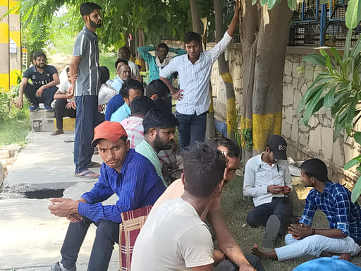 Factory workers staged a sit-in to demand a pay raise.