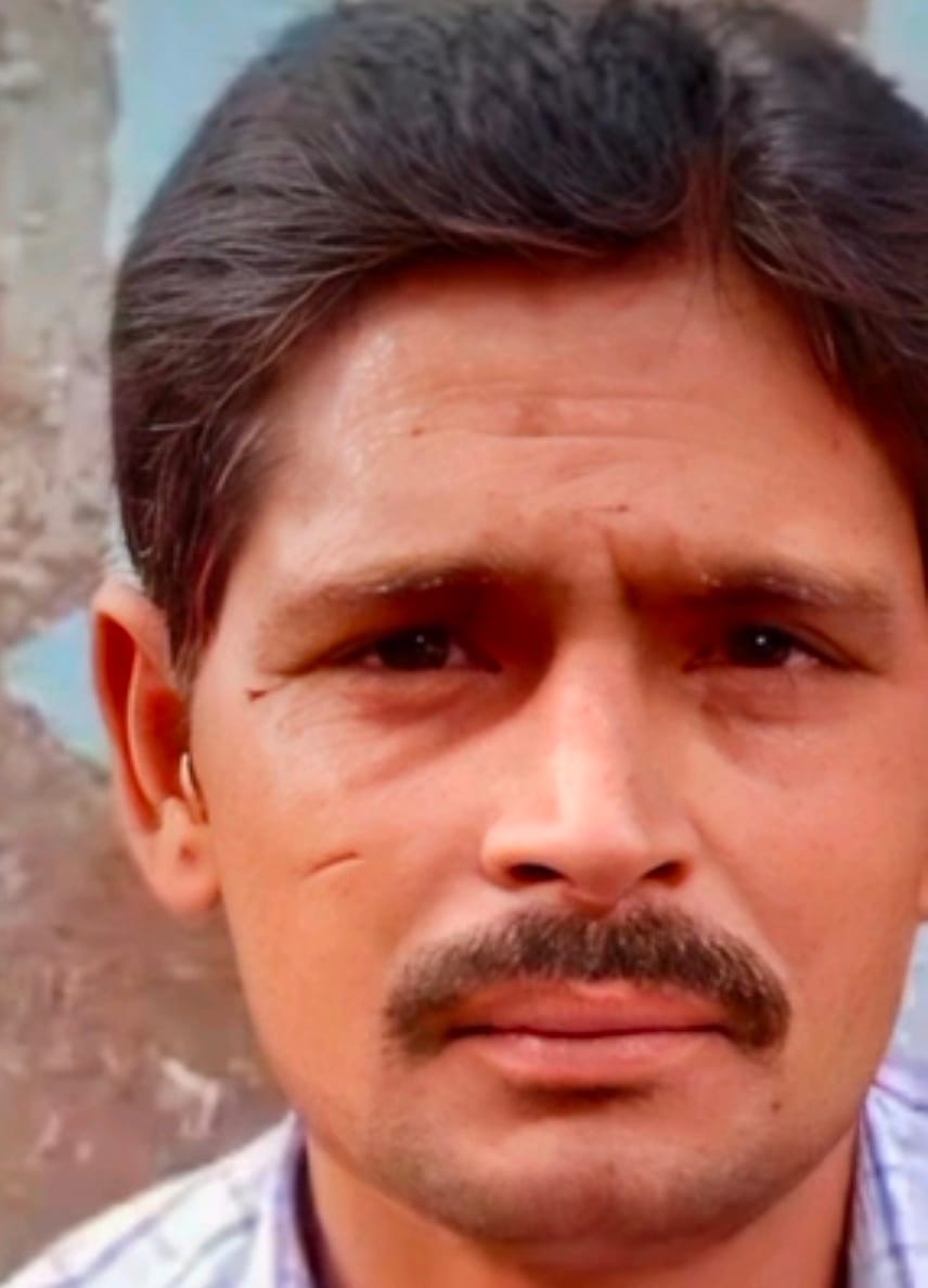 Middle-aged man falls from roof at night; dies.