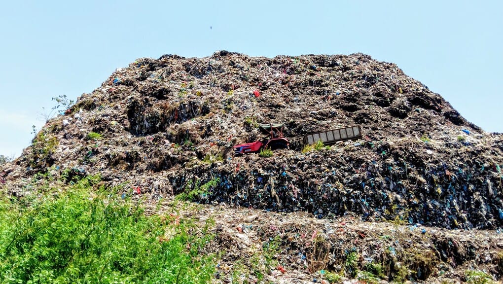 A huge mountain of garbage on Bhainsa Marg in Mawana, the disposal plant continuously fails