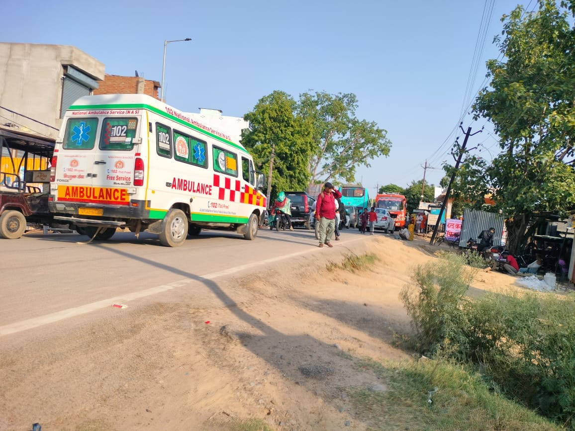 Potholes near the bus stand caused a traffic jam, even an ambulance got stuck.