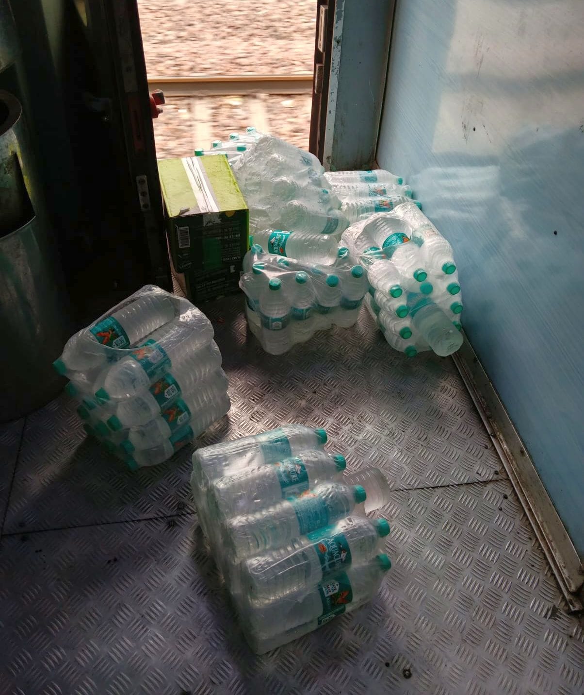 Flouting the rules, water from other companies is being sold openly on trains.