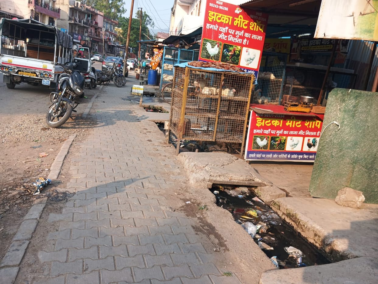 Condition of roads in BBN area: Rainwater flowing on the road instead of drains