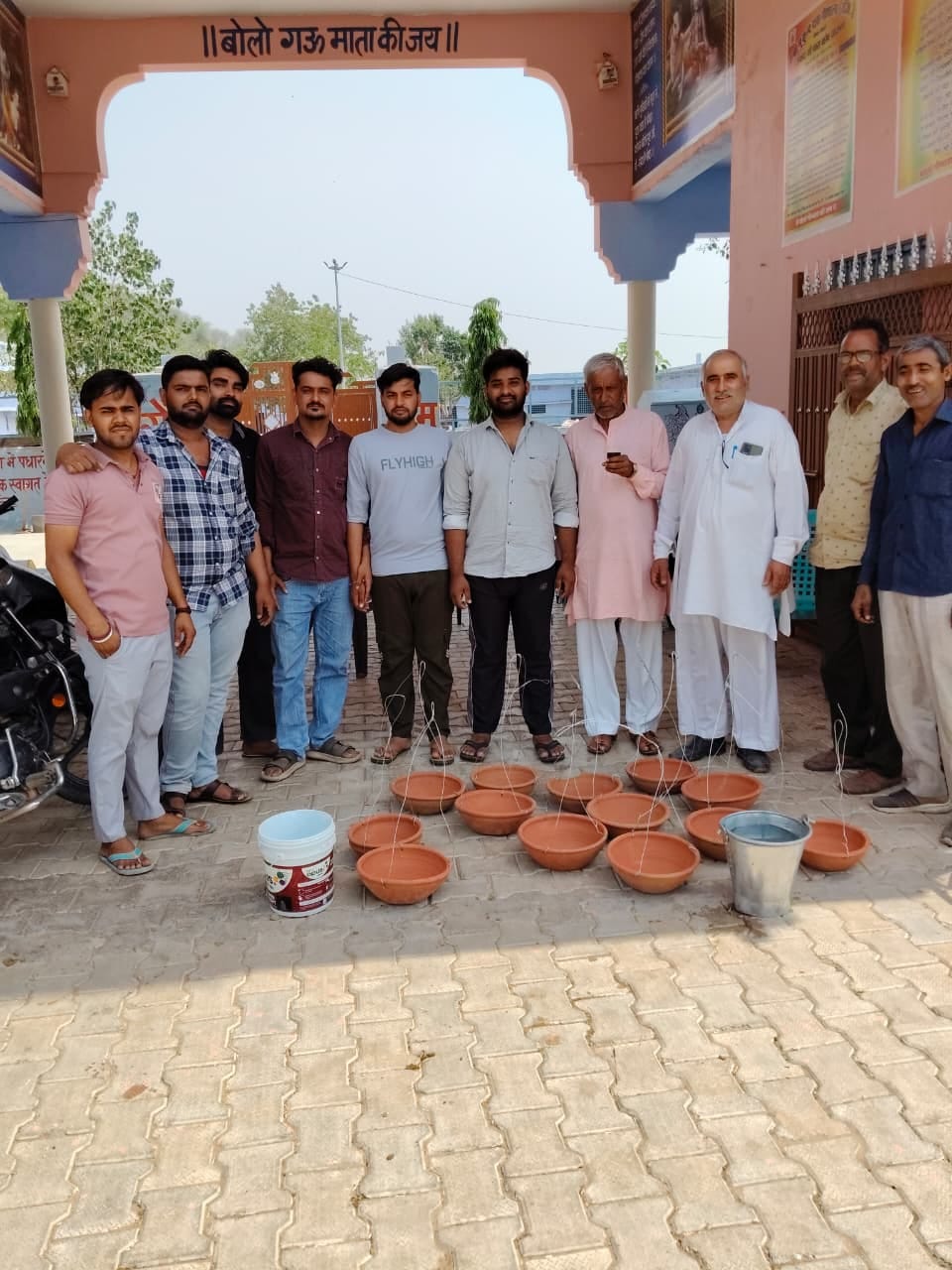 Earthen pots installed in cow shelter for the mute animals