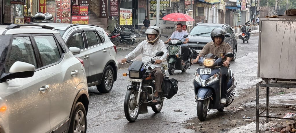 The weather turned pleasant with drizzle in the morning and clouds throughout the day.