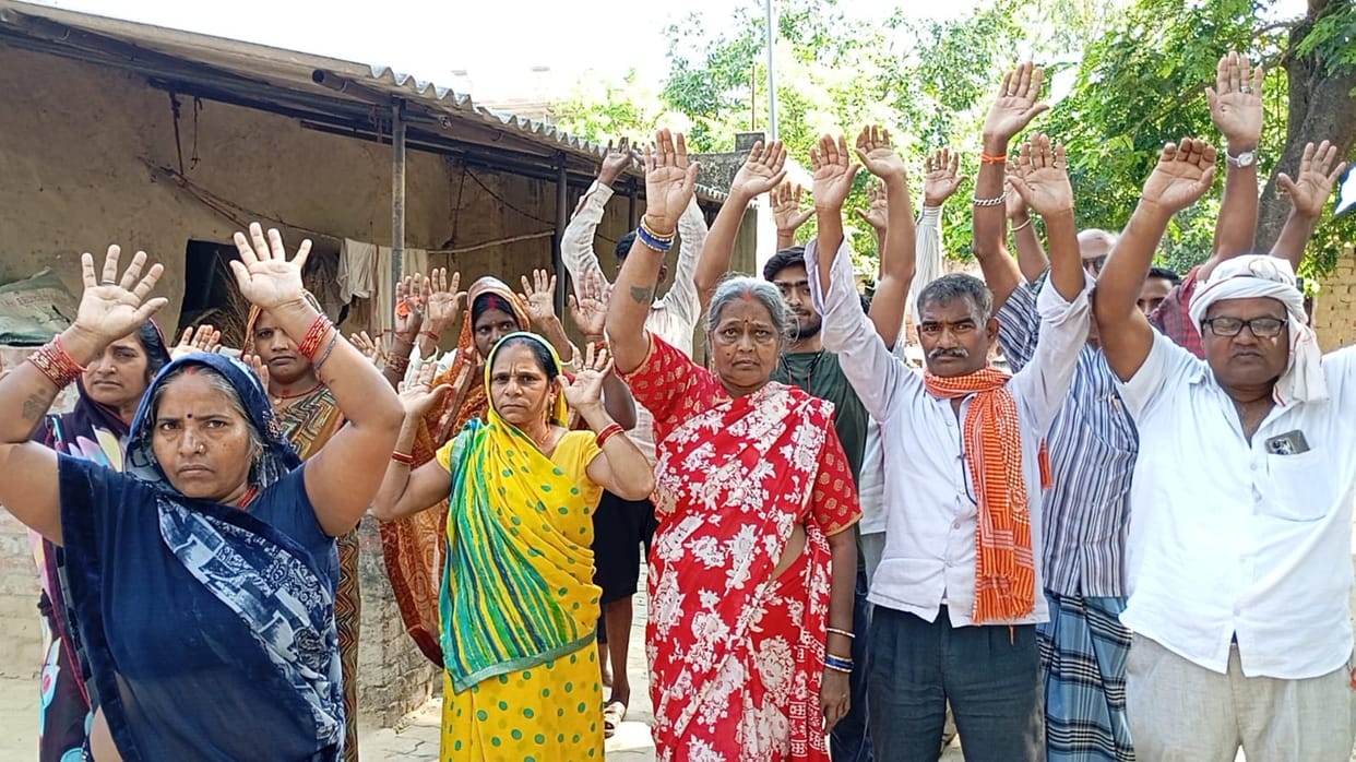 Protest held on waterlogging on interlocking road