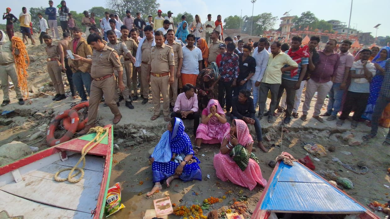 Two pilgrims from Azamgarh drown while bathing in the Ganges; search operations underway.