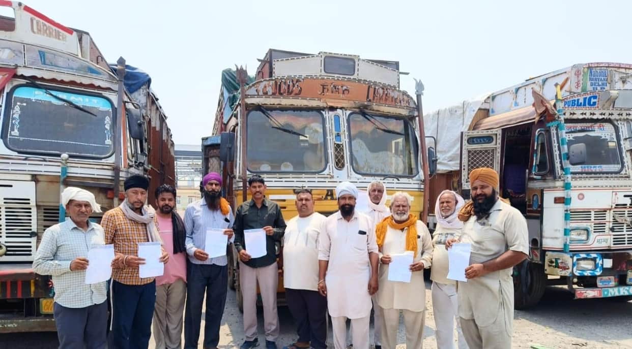 Trucks loaded with wheat have been parked for four days, causing anger among the unions.