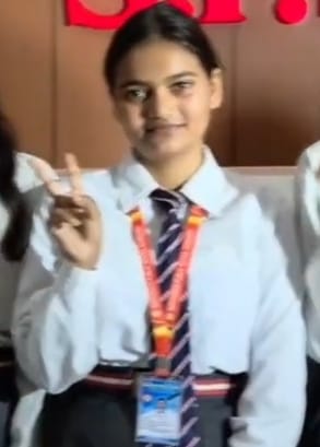 Anjali Yadav became the district topper with 98.6% marks.