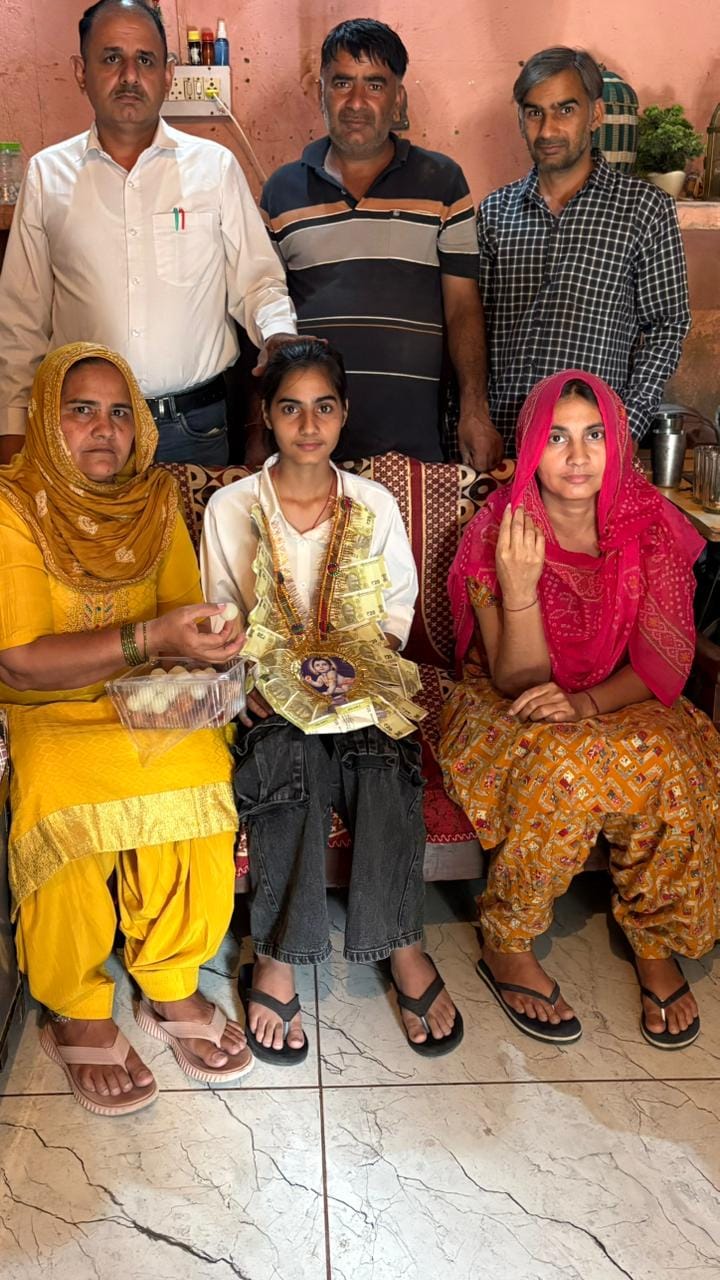 Farmer's daughter Anjali brought glory to her father by becoming the second district topper.