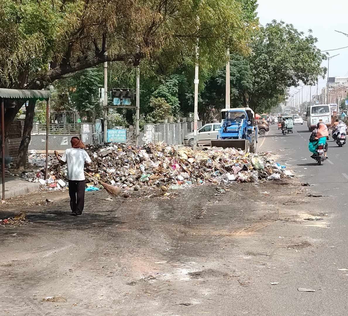 The strike is over and garbage trucks arrive to collect garbage from homes