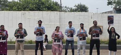 YUNKA unique protest in front of petrol pump with Modi placard