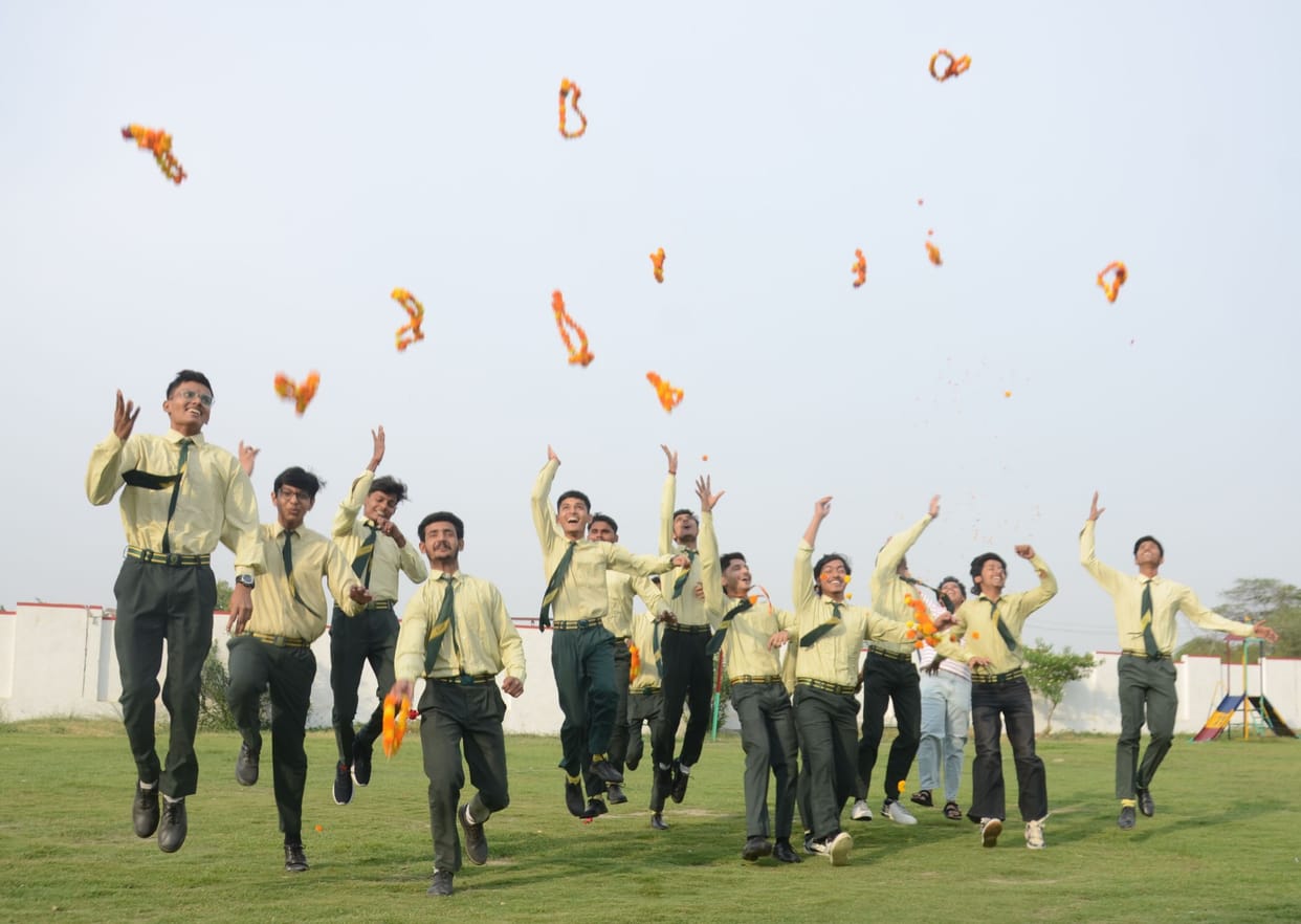 Meritorious students danced with joy to the beat of drums
