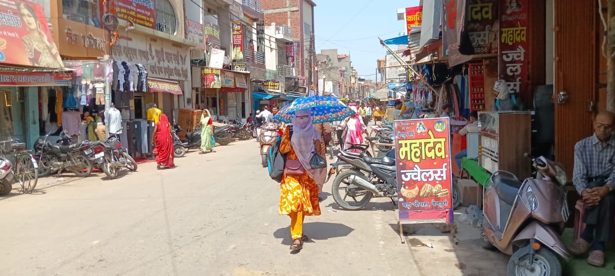 People suffering from the heat due to the sun's attitude