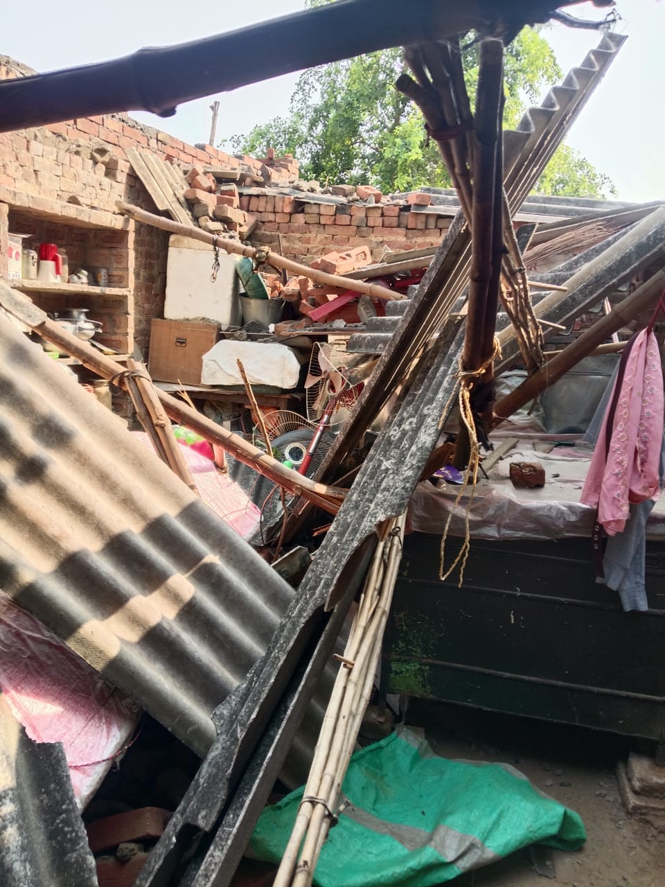 A poor man's house collapsed during the storm, and the mango crop was also damaged.