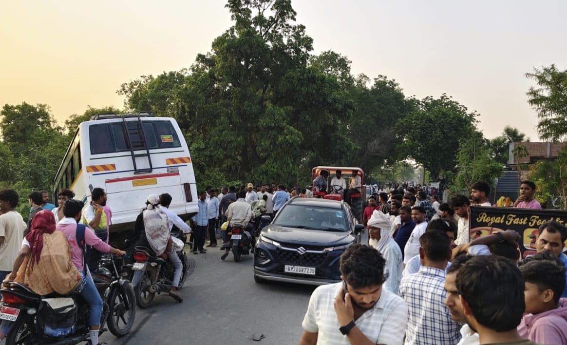 Bike rider hit by bus dies, companion critical