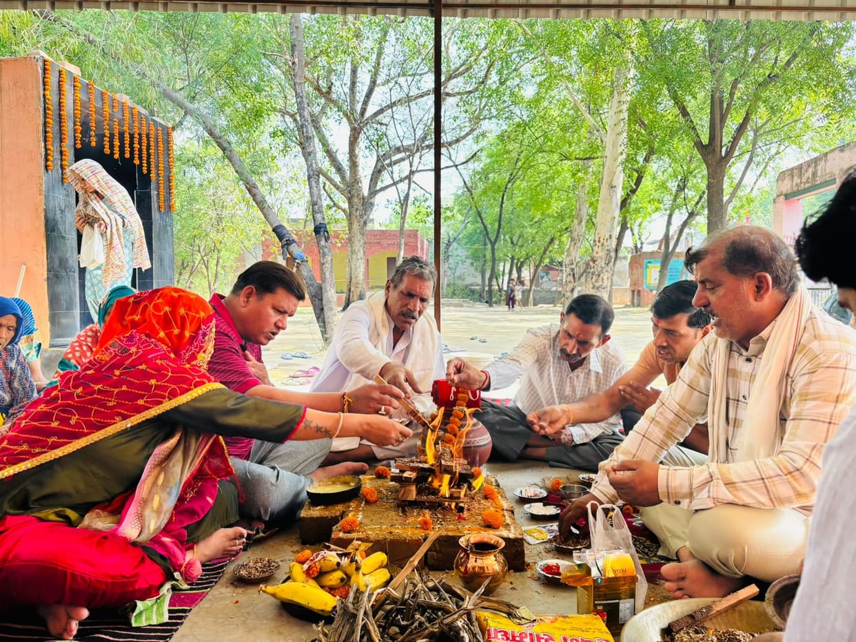 Worshiping Shanidev and praying for happiness and prosperity