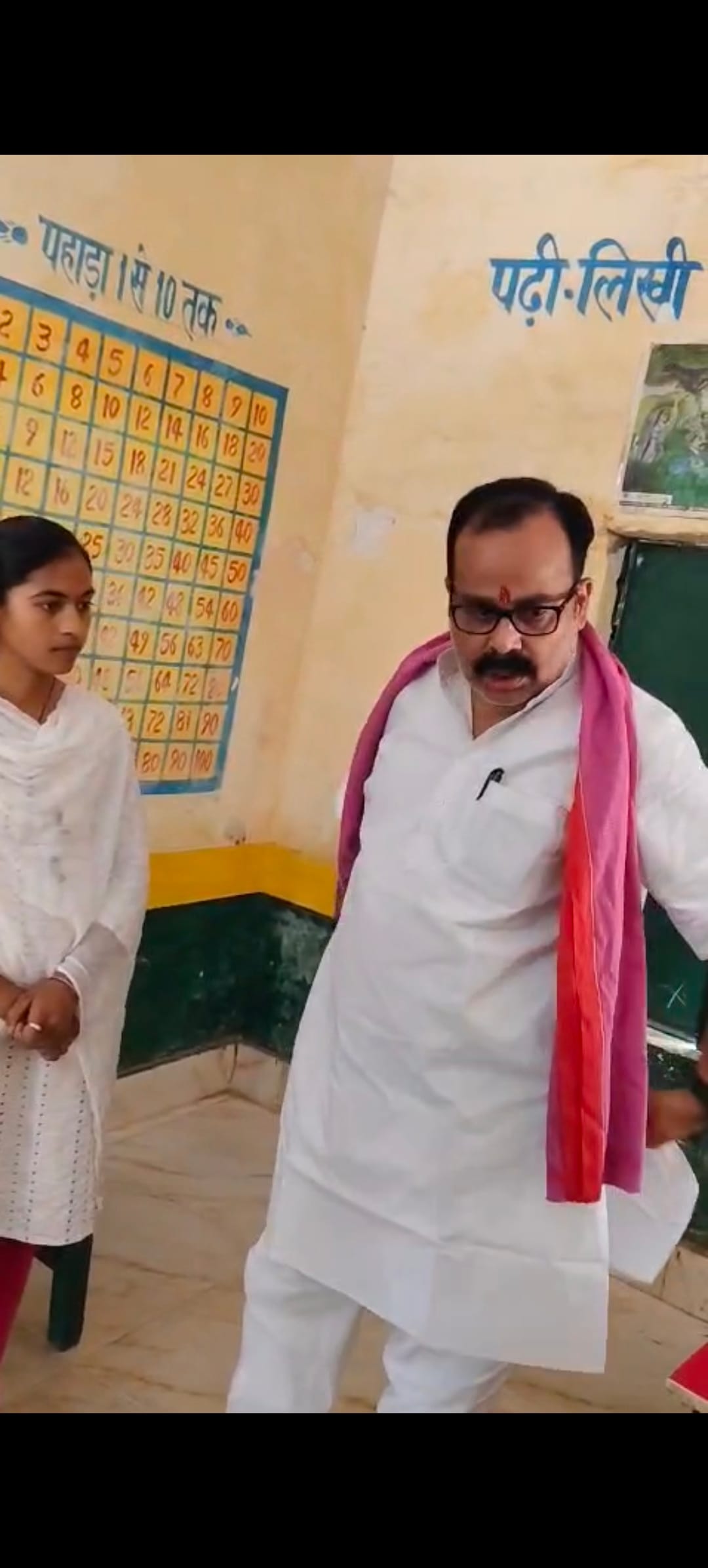 Teacher found absent from school; a female undergraduate student was found teaching the children in his place.
