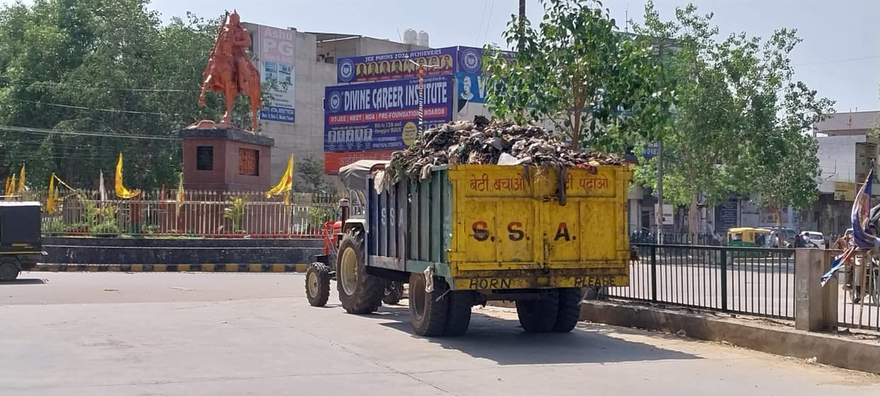NGT orders are being flouted, garbage is being transported in the open.