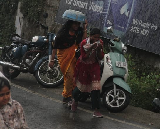 Heavy rain in Dharamshala after noon changed the weather, bringing relief from the heat.