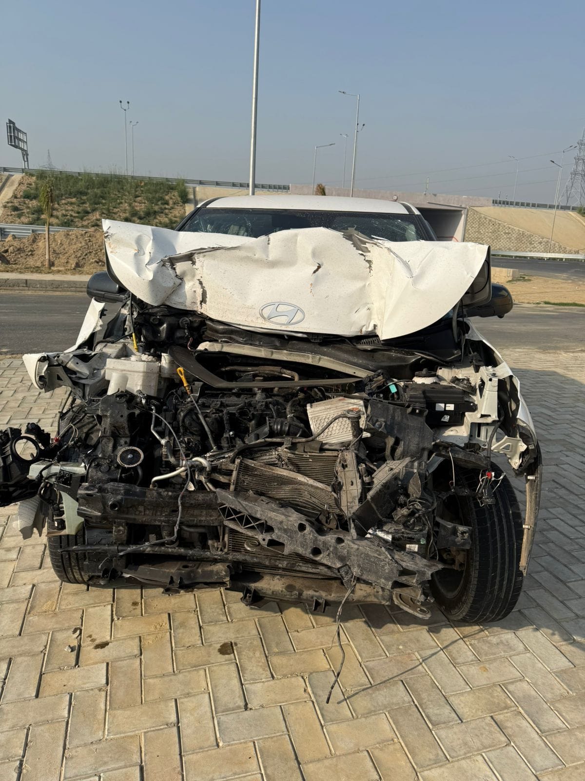 A truck collided with a car on the Ganga Expressway, injuring six people carrying a body to Bihar.