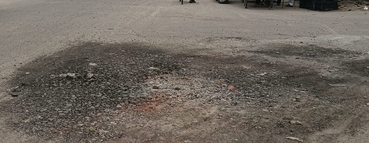 Broken roads outside the bus stand became a problem.