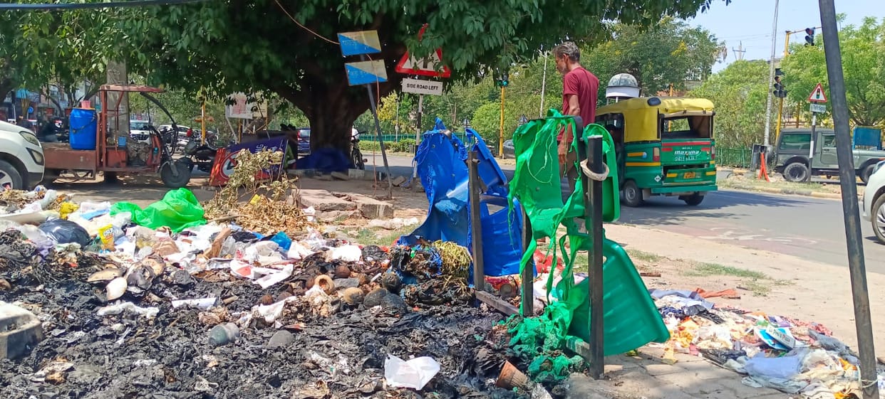 The strike is over, but the city remains buried in garbage.