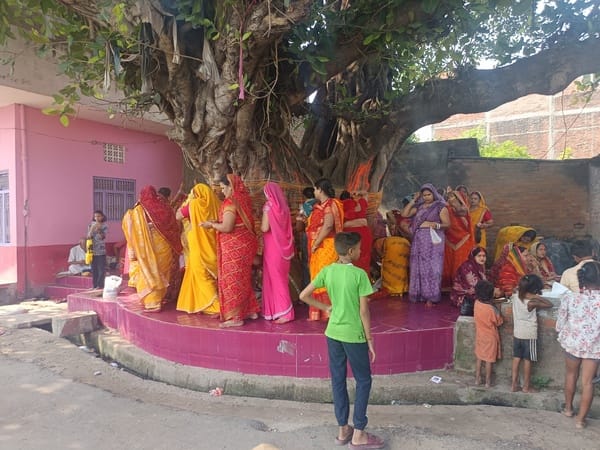 Performing Vat Savitri Puja to pray for her husband's longevity.