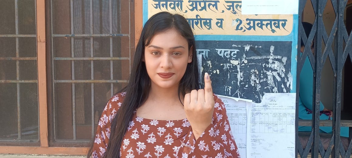 Young voters cast their votes with enthusiasm and responsibility.