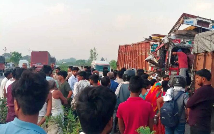 One person died when another truck collided with a parked truck