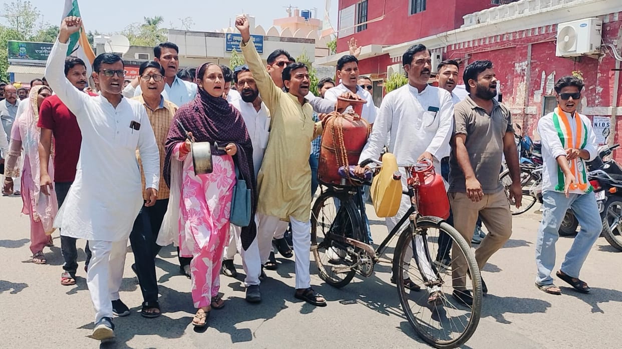 Congress Workers Arrive at Collectorate with Gas Cylinder on a Bicycle