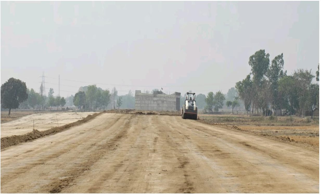 Ring Road: When the fields were vacated, soil started coming in... gravel will be laid before the rains.