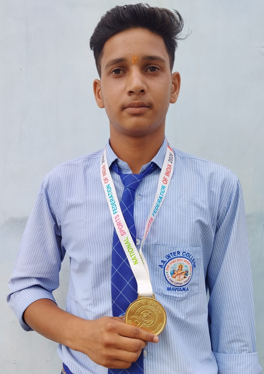 Avi won the gold medal in the national level volleyball competition.