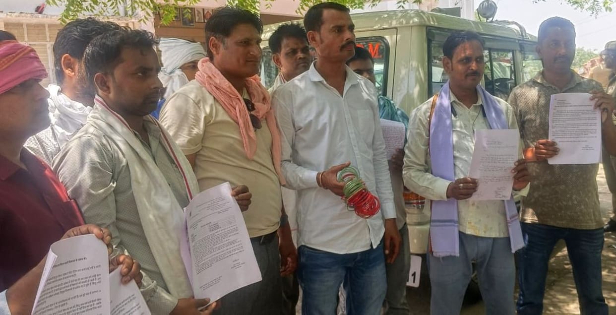 Meter readers protest after not receiving their three-month salary.