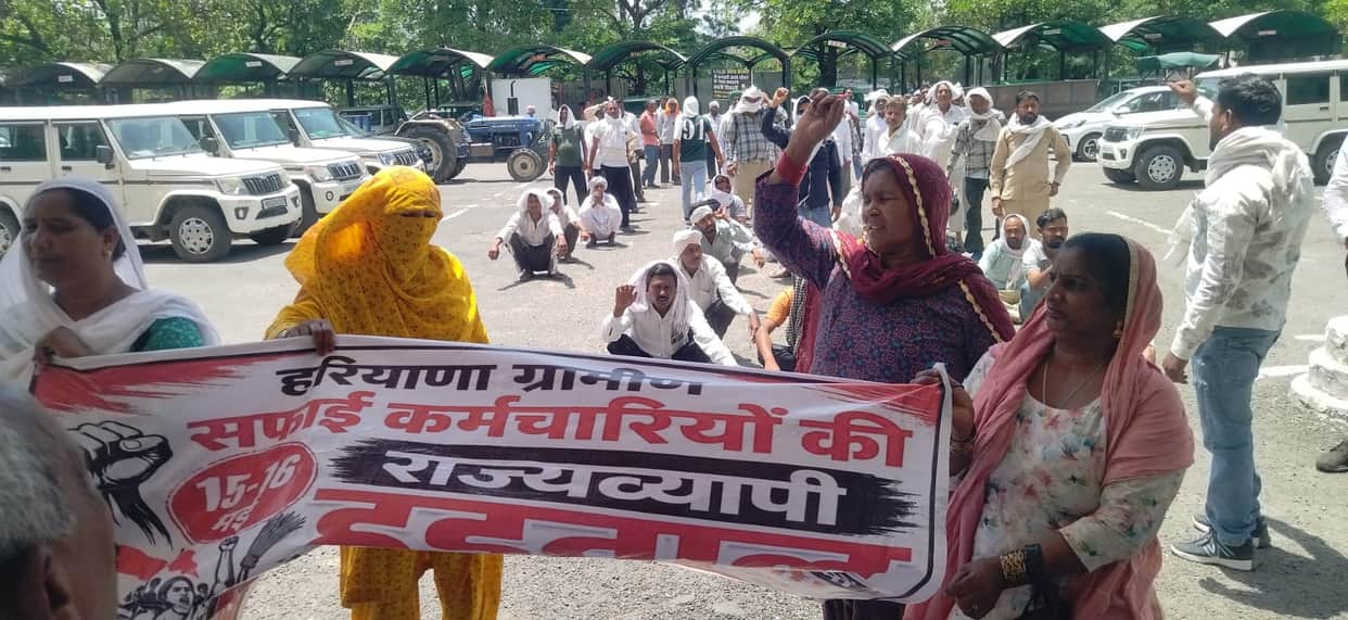 Rural sanitation workers, enraged over their demands, protested for an hour and a half in the scorching sun.