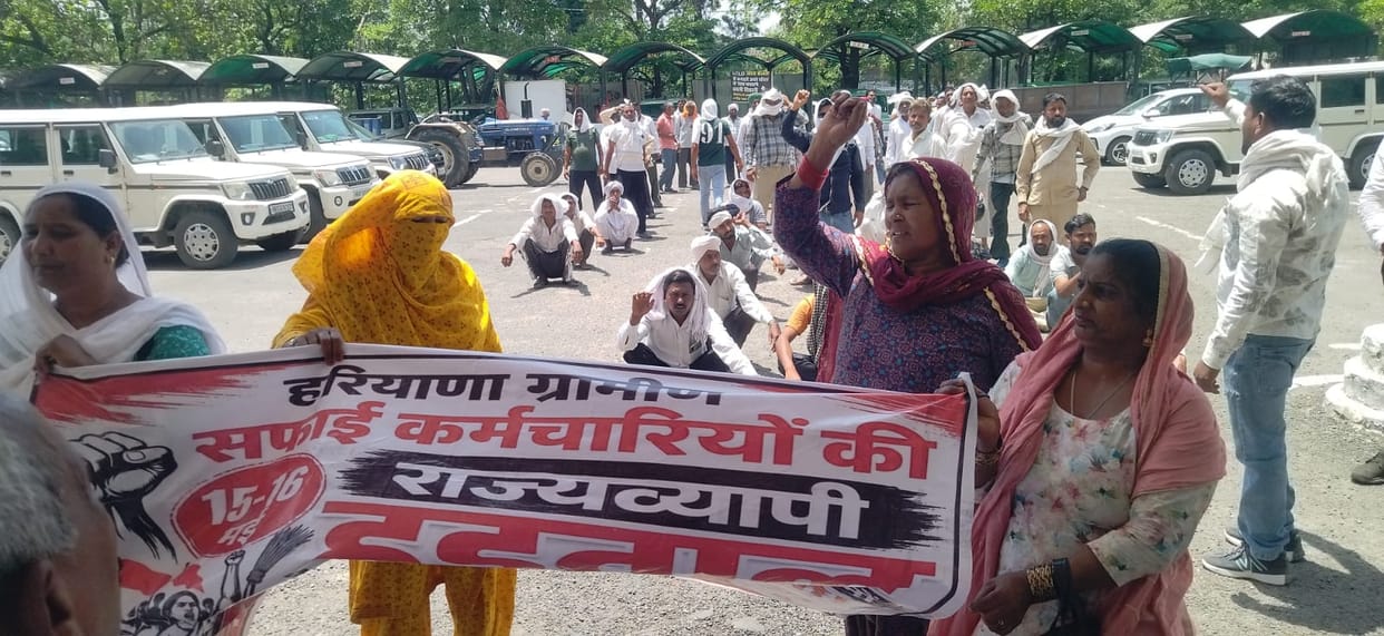 Rural sanitation workers, enraged over their demands, protested for an hour and a half in the scorching sun.