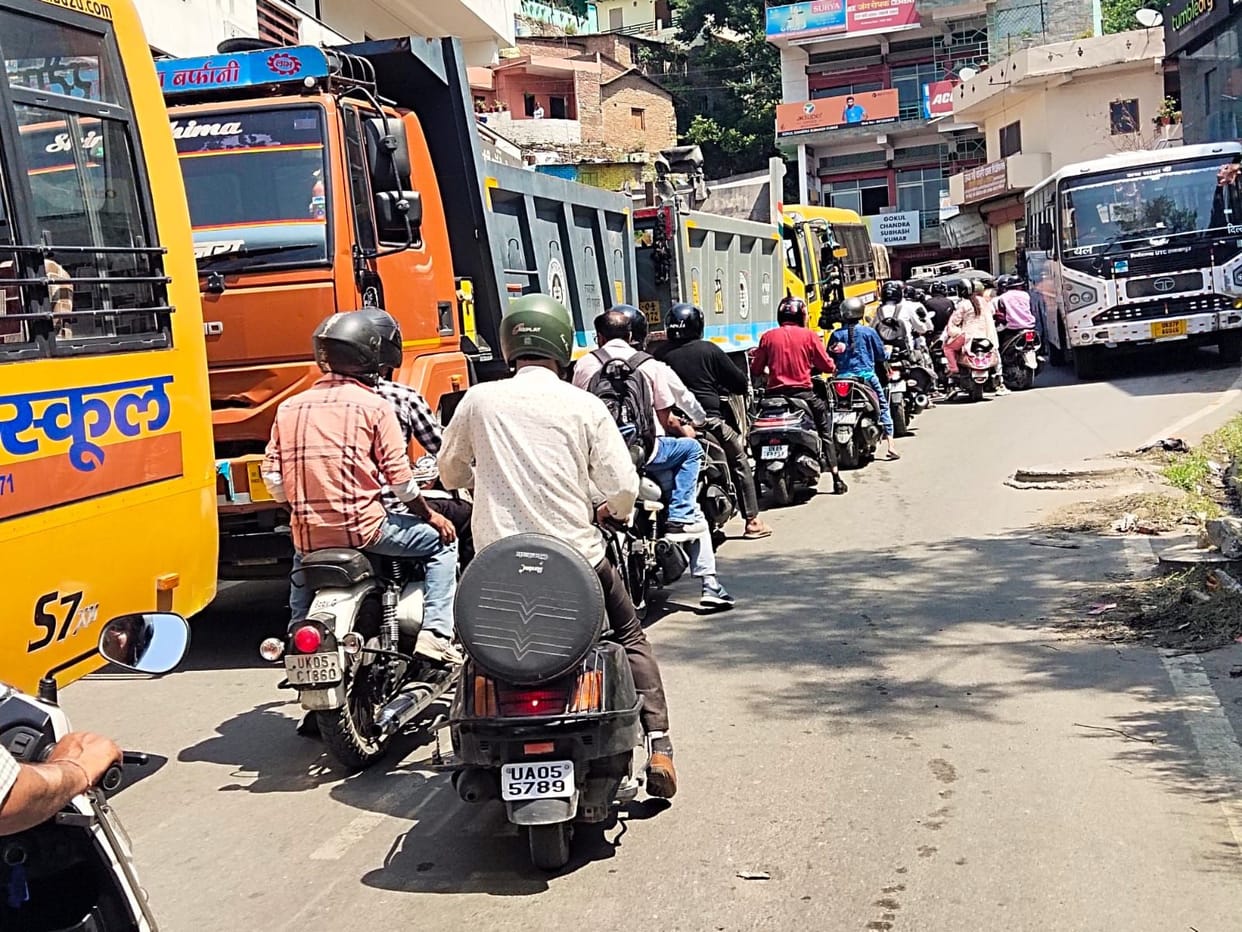 In Pithoragarh, queues for petrol snarled traffic.