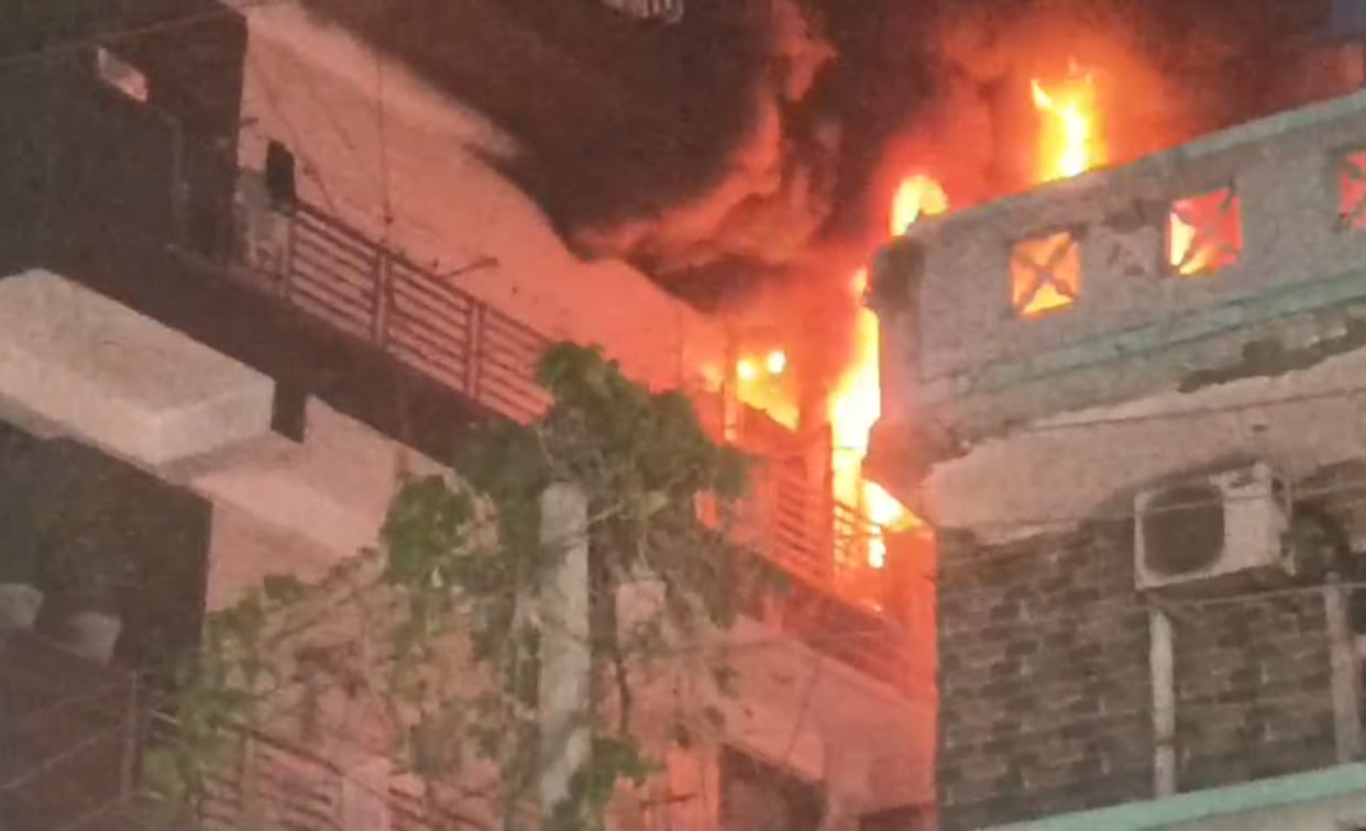 Fire breaks out in flats on the third and fourth floors of an apartment building; 12 rescued.