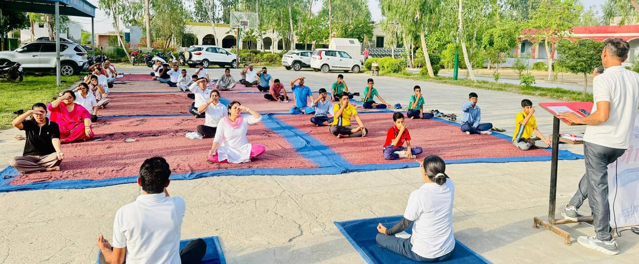 The Department of AYUSH organized a yoga session for students and staff.