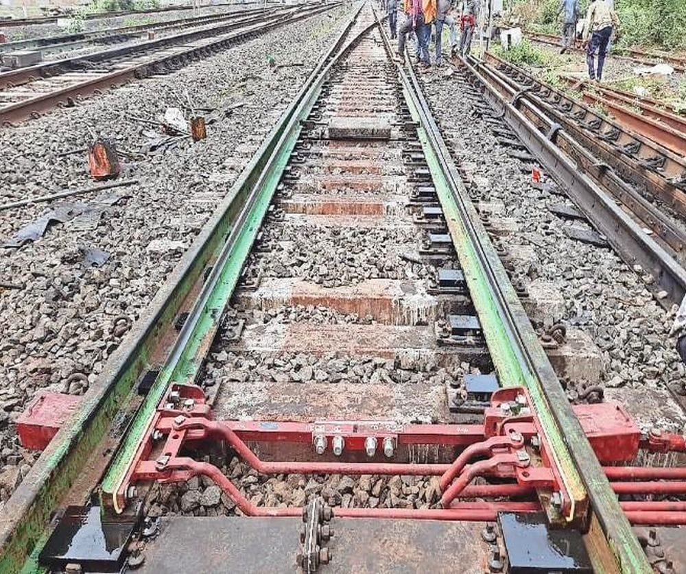 13 thick web switches installed on rail sections