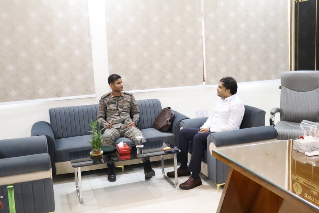 The Army Recruitment Director discussed rally preparations with the Deputy Commissioner.