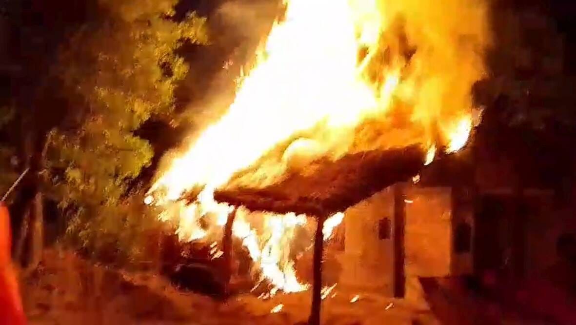 Fire broke out in a thatched house, burning bike and belongings