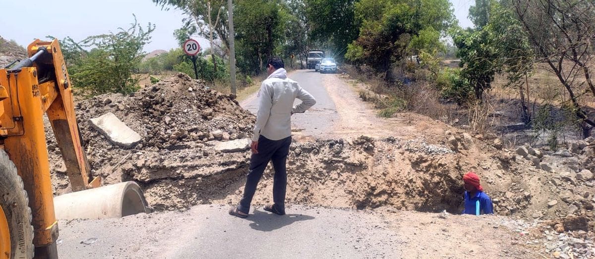 Overloaded dumpers broke a culvert, halting traffic for three hours.