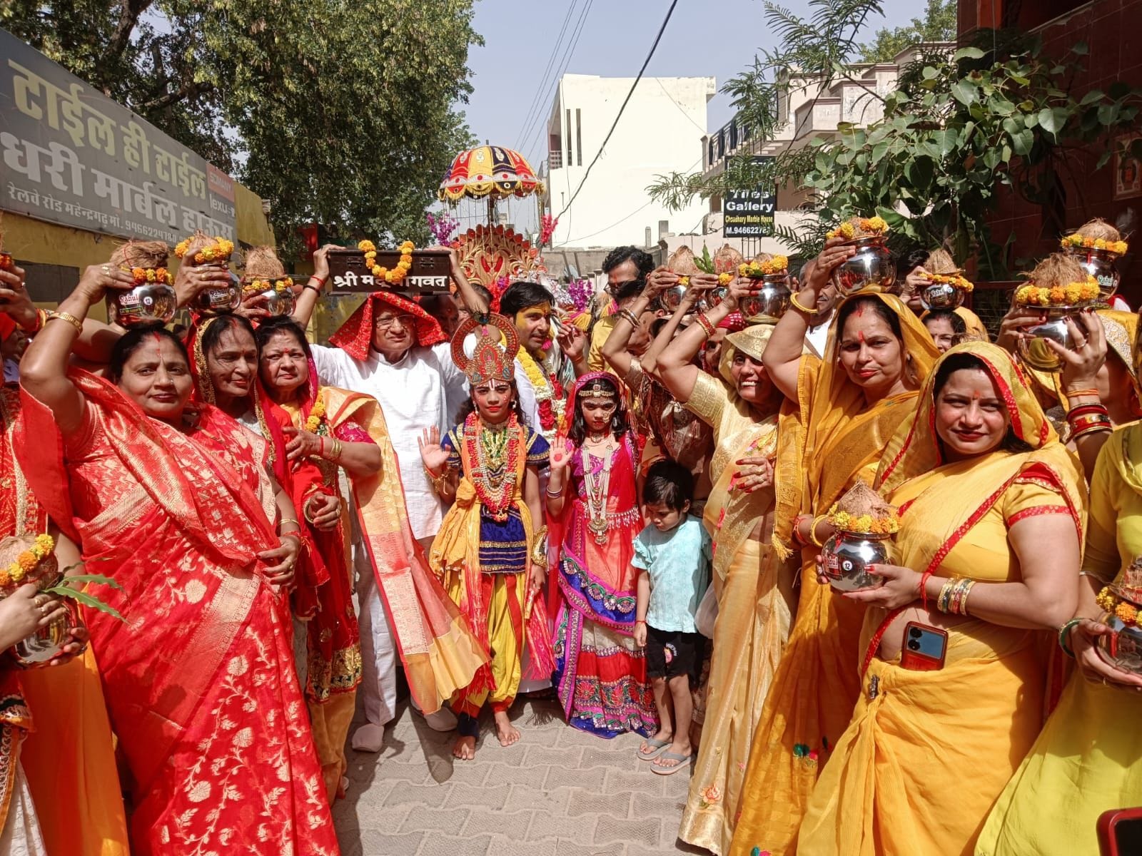 Carrying sacred pots during the procession, 321 women swayed in devotion to Lord Krishna.
