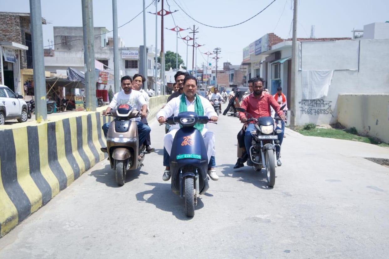 The MLA went on a tour of the town on an electric scooter.