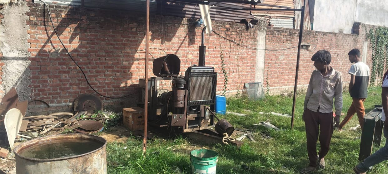 A generator wheel broke and fell on a house and a bus, killing a woman