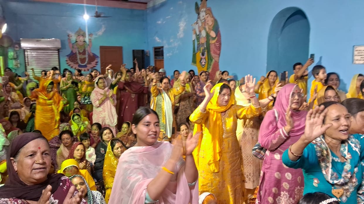 Women dressed in yellow danced on the occasion of Krishna Janmashtami in Jogindernagar.